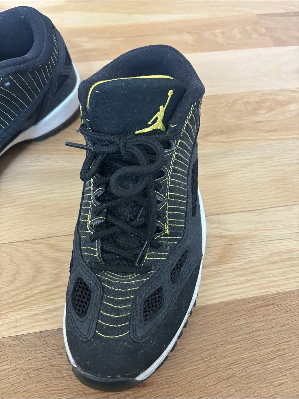 Jordan Men’s Black Sneakers with Yellow Accents size 8